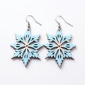 Blue Wooden Snowflake Earrings: Modern, High-detailed Jewelry