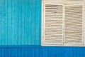 Blue wooden wall and white window exterior Royalty Free Stock Photo