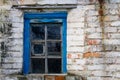 Blue wooden window in old brick wall Royalty Free Stock Photo