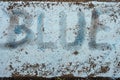 blue word written onn blue chalck texture, macro Royalty Free Stock Photo