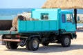 Blue work truck bringing boulders to work area, Golden Point Resort, Fiji, 2015