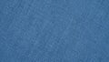 Blue woven surface closeup. Linen textile texture. Graceful color fabric background. Textured braided wallpaper. Macro Royalty Free Stock Photo