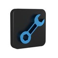 Blue Wrench spanner icon isolated on transparent background. Black square button.