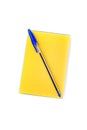 Blue writing pen on unlined note pad with yellow colored tear off pages isolated over white. Top down view Royalty Free Stock Photo