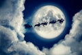 Blue xmas eve night with moon and clouds with Santa Claus sleight and reindeer silhouette flying to bring gifts and Royalty Free Stock Photo