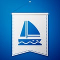 Blue Yacht sailboat or sailing ship icon isolated on blue background. Sail boat marine cruise travel. White pennant Royalty Free Stock Photo