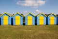 Blue and yellow beach huts Royalty Free Stock Photo