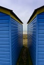 Blue and Yellow Beach Huts Royalty Free Stock Photo