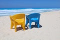Blue and yellow chair at sea beach