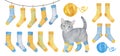 Blue and yellow cosy sock set with playful little kitten.