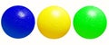 Blue, yellow, green balls on a white background Royalty Free Stock Photo