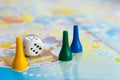 Blue, yellow and green plastic chips, dice and Board games for children Royalty Free Stock Photo