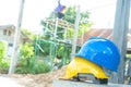 Blue and yellow hard safety helmet hat for safety workman. Royalty Free Stock Photo