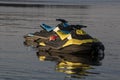 blue and yellow motorized water craft