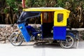 Blue And Yellow Mototaxi In Peru South America