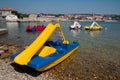 Blue and yellow pedalo boat on seaside at Krk -Croatia Royalty Free Stock Photo