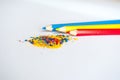 Blue yellow red pencil crumbs Royalty Free Stock Photo