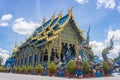 Blue Yellow Thai Church and Serpent or Naga in Wat Rong Sues Ten Temple on Left View