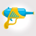 Blue and yellow toy cosmic water gun on a white background. Royalty Free Stock Photo