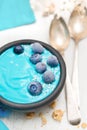 Blue yogurt with berries in the black bowl Royalty Free Stock Photo