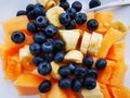 Blueberries with bananas and melon pieces Royalty Free Stock Photo