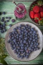 Blueberries, blueberry juice and strawberries Royalty Free Stock Photo