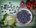 Blueberries, blueberry juice and strawberries Royalty Free Stock Photo