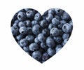 Blueberries in heart shape isolated on a white. Fresh Blueberry Background. Texture blueberry berries close up.