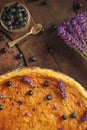 Blueberries and lavander cheesecake served on oven with berries and flowers, still life for patisserie, healthy cake Royalty Free Stock Photo