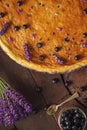 Blueberries and lavander cheesecake served on oven with berries and flowers, still life for patisserie, healthy cake Royalty Free Stock Photo