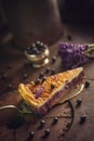 Blueberries and lavander cheesecake served on oven with berries and flowers, still life for patisserie, healthy cake Royalty Free Stock Photo