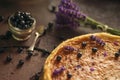 Blueberries and lavander cheesecake served on oven with berries and flowers, still life for patisserie, healthy cake Royalty Free Stock Photo