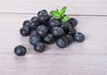 Blueberries on a light wooden background