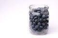 Blueberries in mason jar. Heap of natural berries