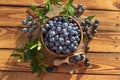 Blueberries On Old Wooden Planks Top View. Outdoor Image Shot In The Sunshine
