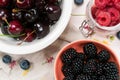 Blueberries, raspberries, cherries and black berries from above Royalty Free Stock Photo