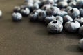 Blueberries ripe and tasty on a black background. Berries close up, Texture blueberry.