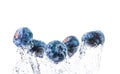 Blueberries splashing in water isolated on white background. Product photography, antioxidant concept Royalty Free Stock Photo