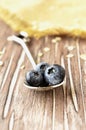 Blueberries on a teaspoon, selective focus