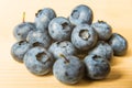 Blueberries on a white cotting board Royalty Free Stock Photo