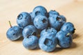 Blueberries on a white cotting board Royalty Free Stock Photo