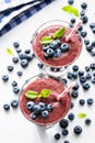 Blueberry acai smoothie in glass on white background Royalty Free Stock Photo