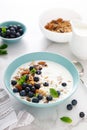 Blueberry and almond granola with greek yogurt, cottage cheese and fresh berries Royalty Free Stock Photo