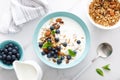 Blueberry and almond granola with greek yogurt, cottage cheese and fresh berries Royalty Free Stock Photo