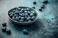 Blueberry - antioxidant organic superfood in a bowl concept for healthy eating and nutrition