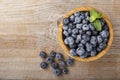 Blueberry antioxidant organic superfood in a wood bowl concept for healthy eating and nutrition. Concept for healthy eating and nu Royalty Free Stock Photo