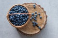 Blueberry in basket on wooden table background. Ripe and juicy fresh picked blueberries closeup, top view Royalty Free Stock Photo