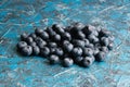 Blueberry berry on table close up macro, blue concrete background with copy space Royalty Free Stock Photo