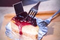 Blueberry cheese cake in white dish on the wood Royalty Free Stock Photo