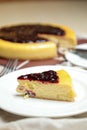 Blueberry Cheesecake slice include caramel with fork and knife served in plate isolated on table top view of cafe bake food Royalty Free Stock Photo